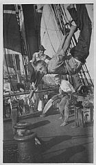 Gymnastics and play on a sailing ship. First-voyage boys were young, often confirmation age, 14-15 years old. Photo: Gift from Per Arne Olaussen. Norwegian Maritime Museum. 
